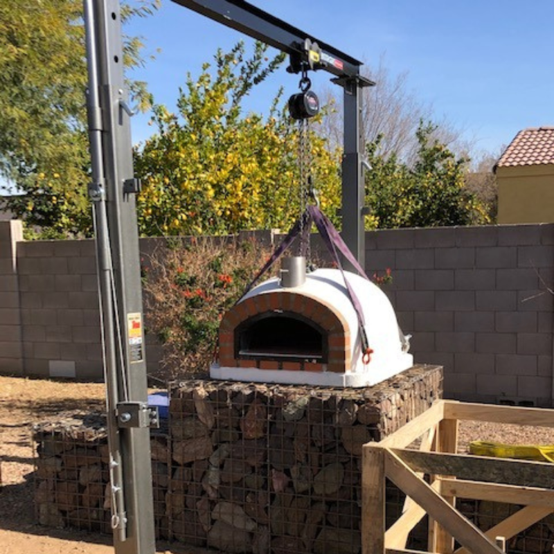 Pizzaioli Rustic Arch Brick Pizza Oven Lifted by a Crane