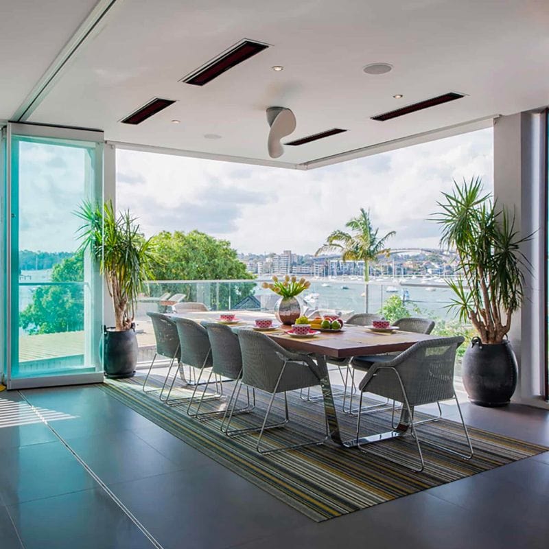 Bromic electric heater warming an outdoor deck