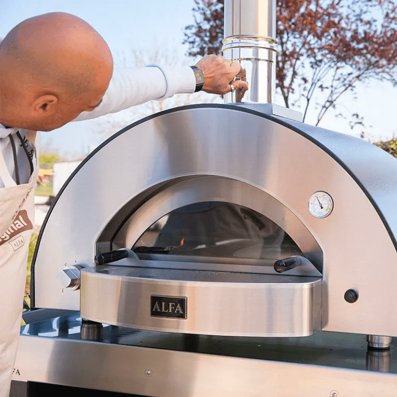 Man Using the Low and Slow Kit on the Alfa Oven