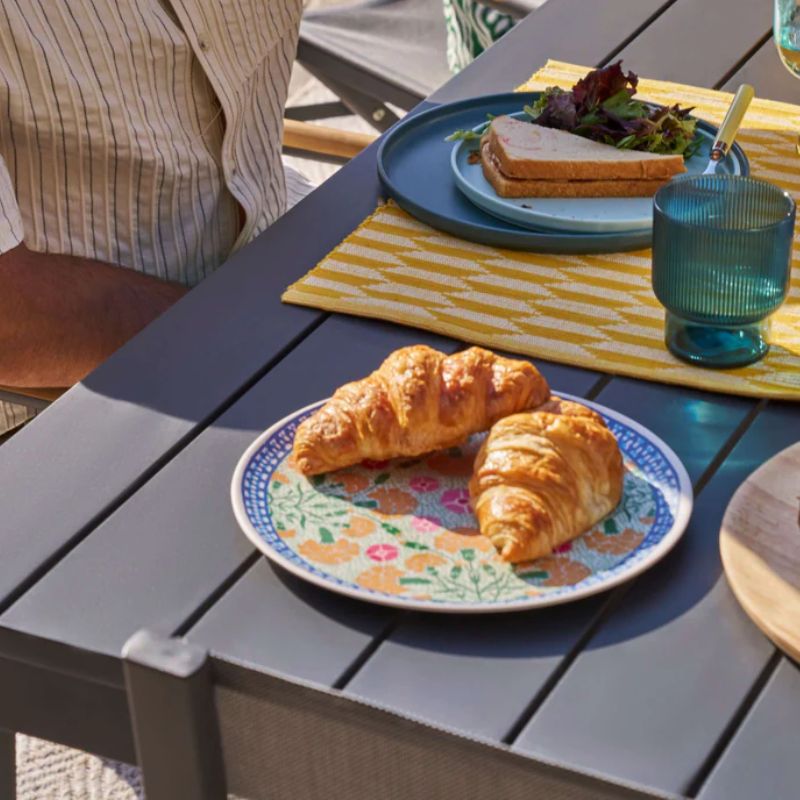 Outer aluminum outdoor dining table styled for outdoor meal