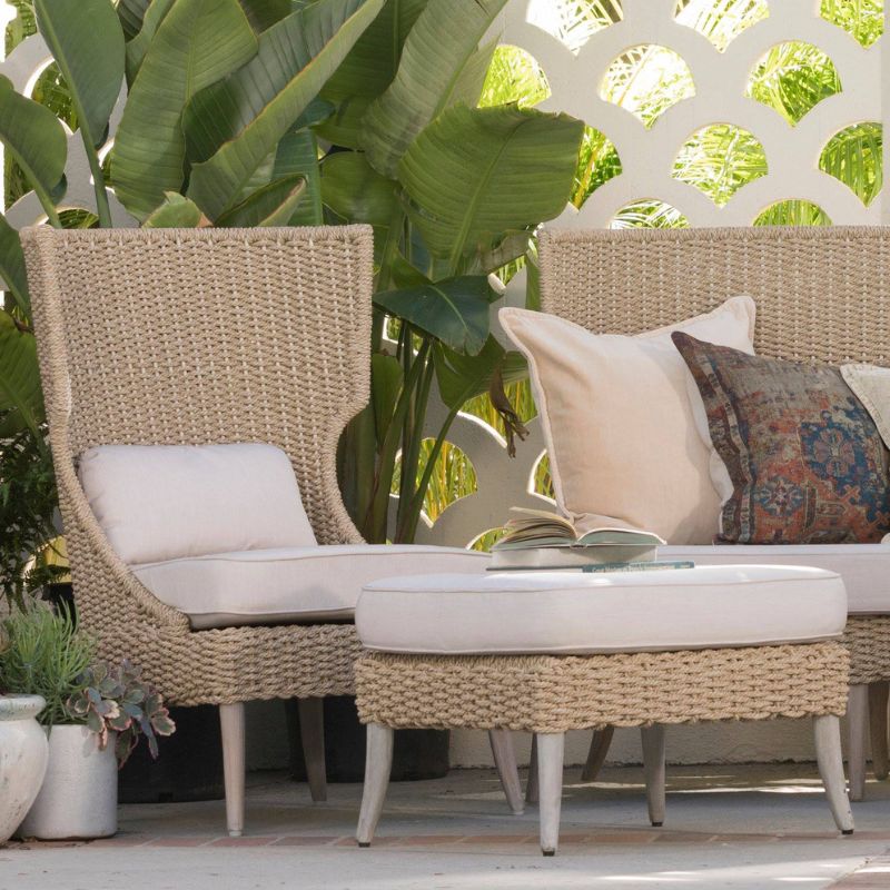 Arla Lounge Chair with graden plants behind