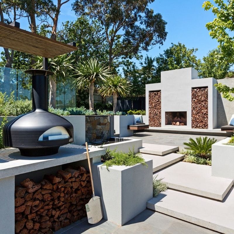 Polito Giotto Wood Fired Oven With Bench Stand in an Outdoor Kitchen