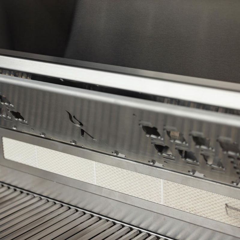 Blaze LTE PRO Grill with Warming Rack lifted in Upright Position exposing the rear burner