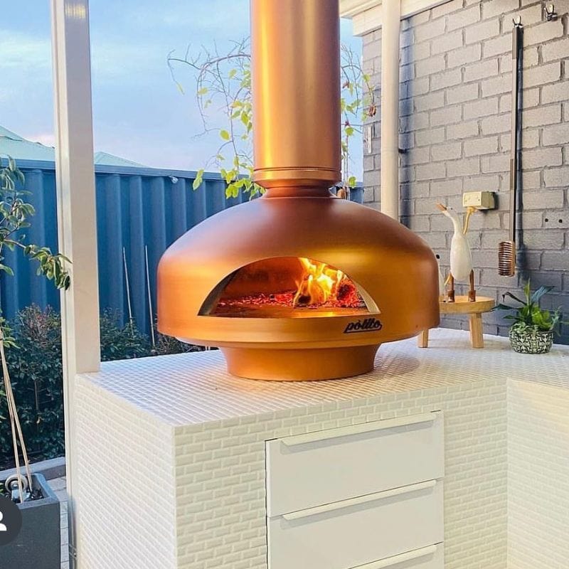 Polito Giotto Wood Fired Oven With Bench Stand with a live fire inside