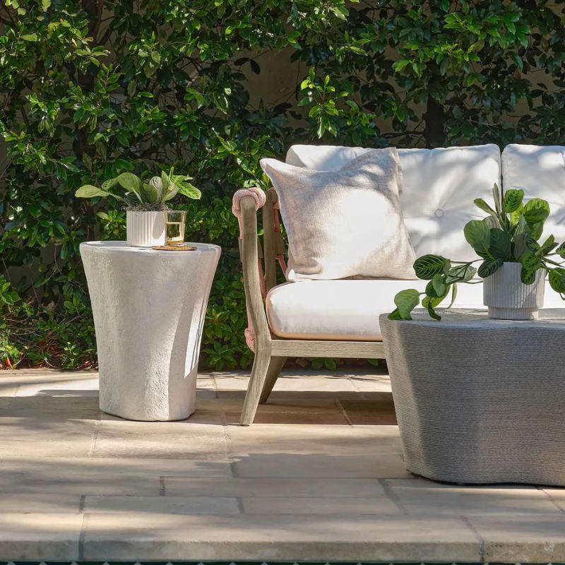 Kingsley Sofa in Blush Rope and Graywashed Rustic Teak Finish on the outdoor seating area