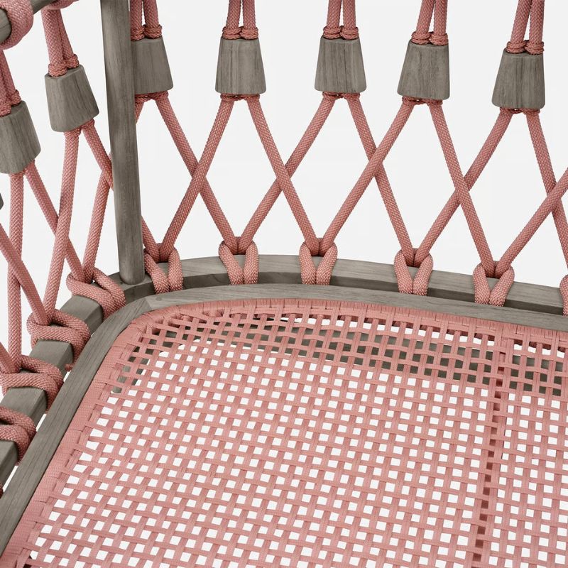 Blush rope woven onto the chair and twisted to form a diamond pattern for the backrest