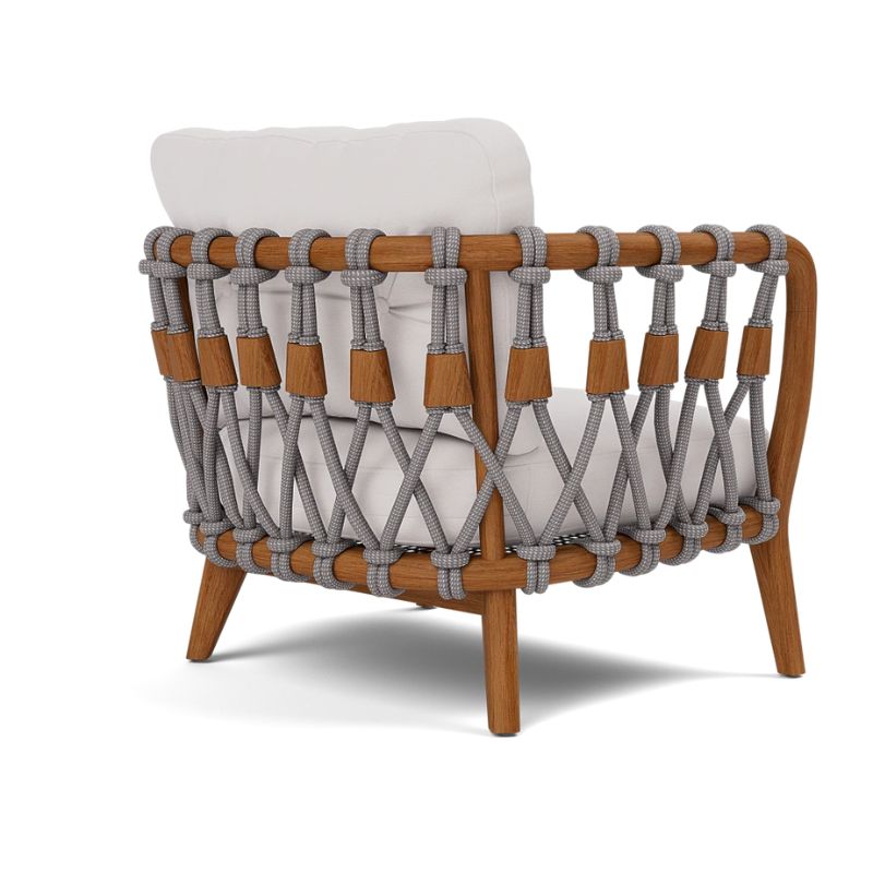 Angled back view of Kingsley Lounge Chair in zinc rope with Weathered Natural Rustic Teak frame and Alsek White fabric
