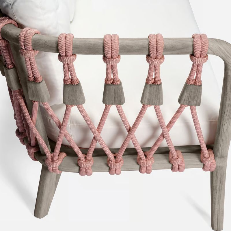 Blush Rope looped around the Graywashed Rustic Teak Frame of the Kingsley Lounge Chair forming a diamond pattern