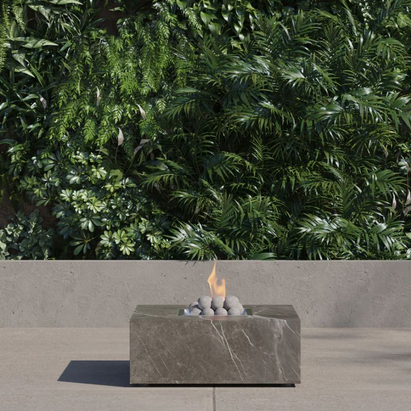 OuterStone Square fire pit table with ceramic stone spheres with fire burning