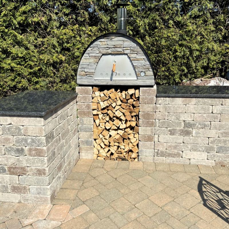 Maximus Pizza oven with granite kitchen countertops for outdoors