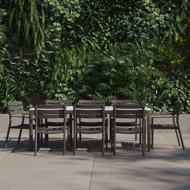 Set of 8 Arm Chairs with OuterStone Dining table under natural lighting | All-weather dining table