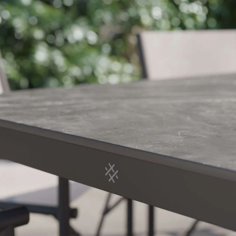 OuterStone Outdoor Dining tabletop details with Outer logo detail