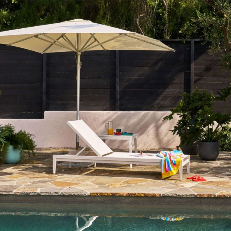 OUTER White Square Umbrella with White Aluminum Chaise Lounge by the pool
