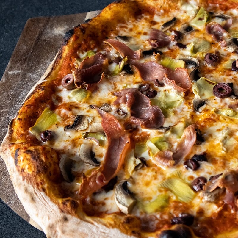 Delicious Supreme Pizza on the Pinnacolo Acacia Wooden Peel