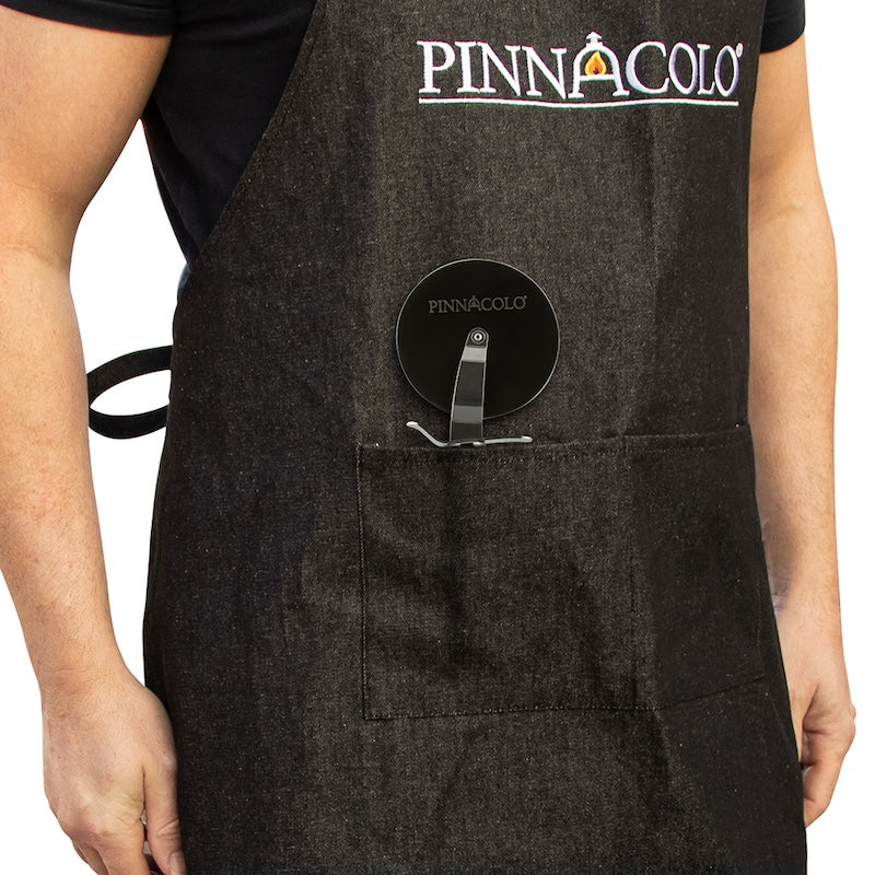 Pizza Cutter in the pocket of the Pinnacolo Denim Apron