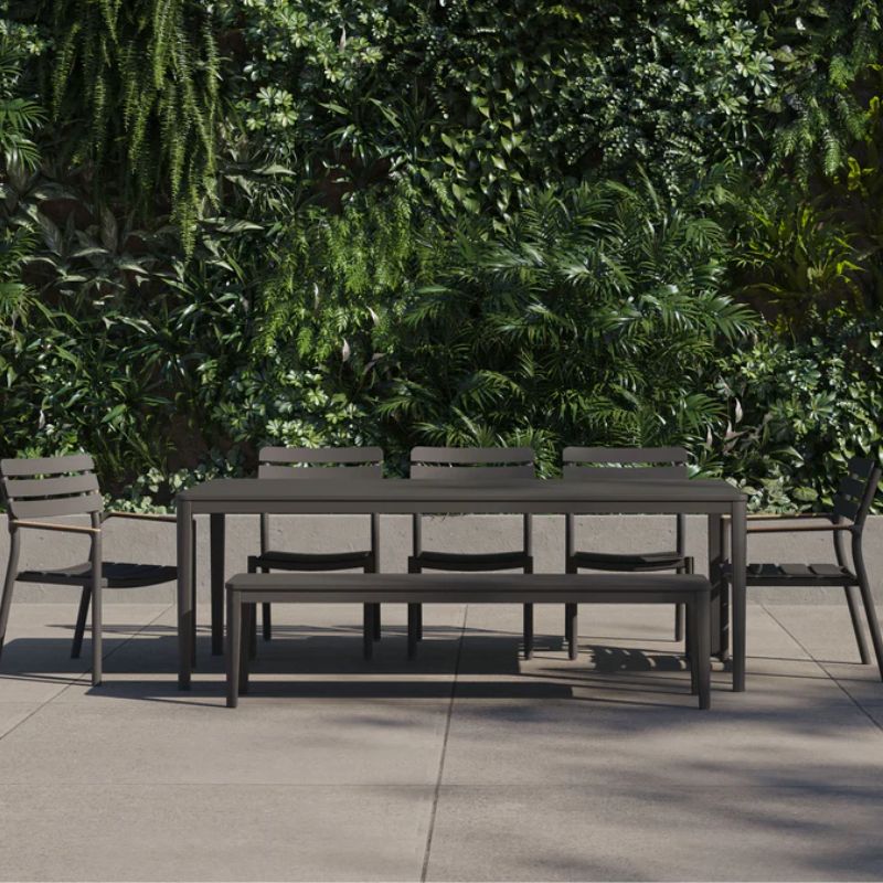 Modern aluminum dining table with 3 armless chairs, 2 armchairs, and bench set in patio