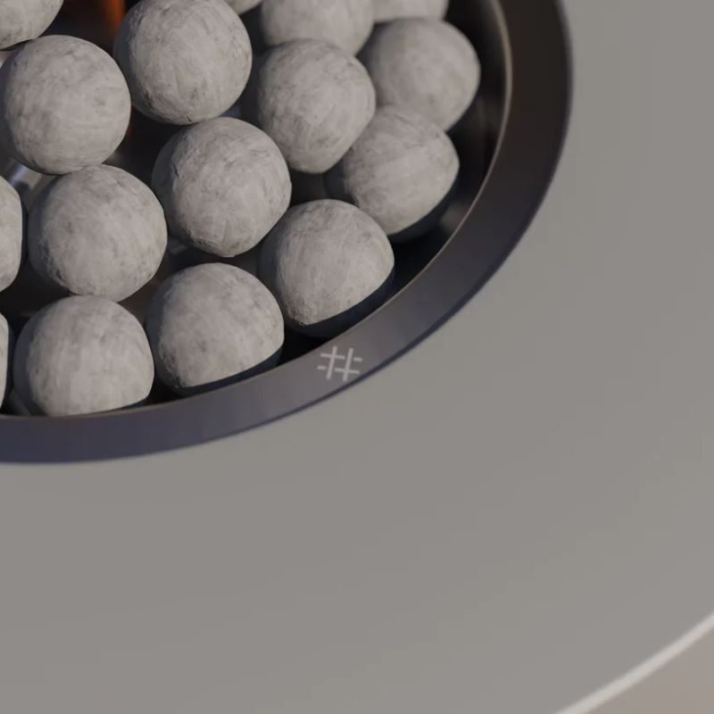 Ceramic stone spheres and concrete finish details on the OUTER fire pit