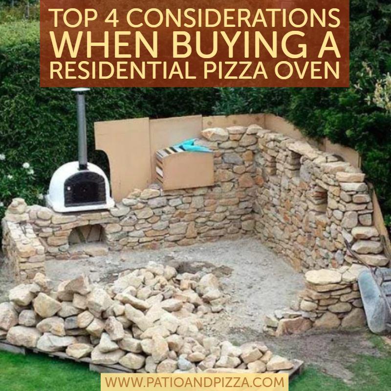 Brick pizza oven with chimney in outside patio area