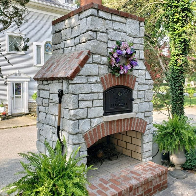 Round Grove Fireplace with Brick Pizza Oven