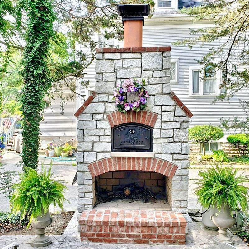 Round Grove Fireplace with Brick Pizza Oven