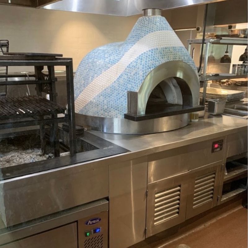 Model 90-PA-CT inside a Kitchen with Blue and White Tiles