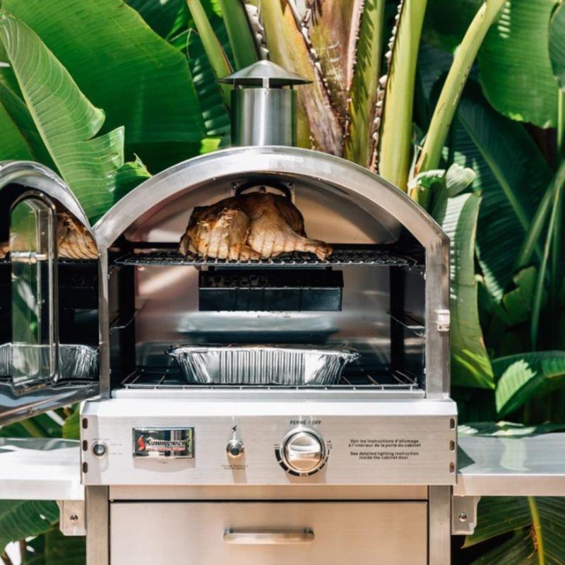 Cooking chicken and vegetables in the Summerset Pizza Oven