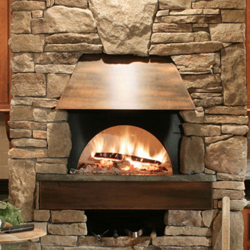 Indoor wood burning pizza oven built from Earthstone Ovens Modular DIY Kit
