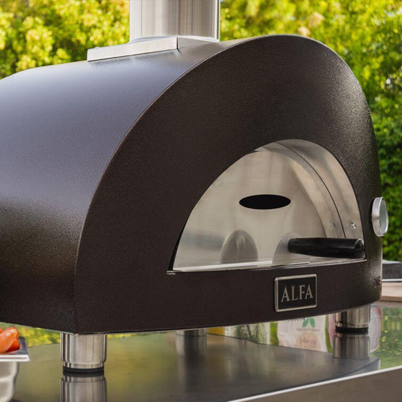 Outdoor pizza oven, Alfa ONE, sitting on a stainless steel table